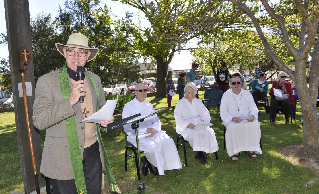 ALL CREATURES: Bishop Stuart Robinson led Sunday's Blessing of the Pets service at Christ Church, West Goulburn amid glorious sunshine.