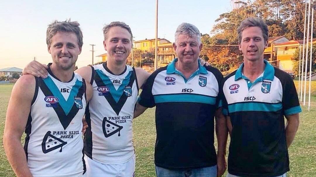 Darren Williams with his three sons. Picture supplied