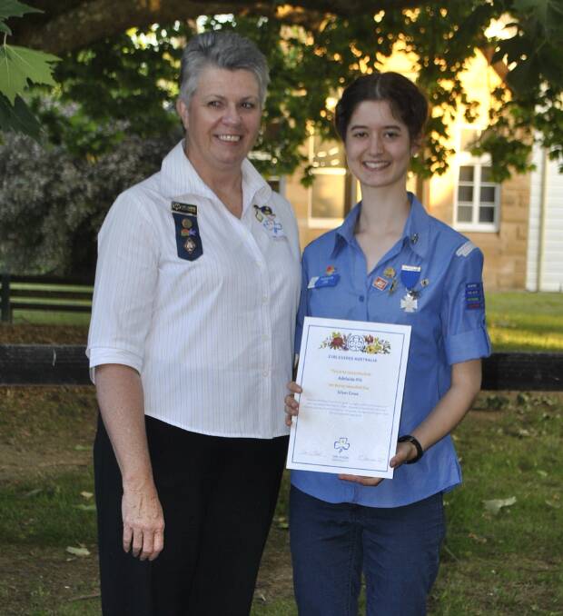 ACT OF COURAGE: Girl Guides state commissioner Sarah Neill and silver cross award recipient Adelaide Pilt at Mittagong Girl Guide Hall recentlyh. Photo: Emily Bennett
