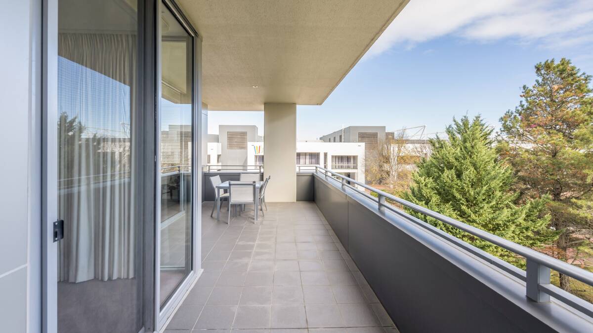 CITY LIVING: The two-bedroom apartment is sprawled over 102 square metres of living space and a 19-square-metre balcony, looking out over historic Glebe Park to the edge of Canberra's CBD.