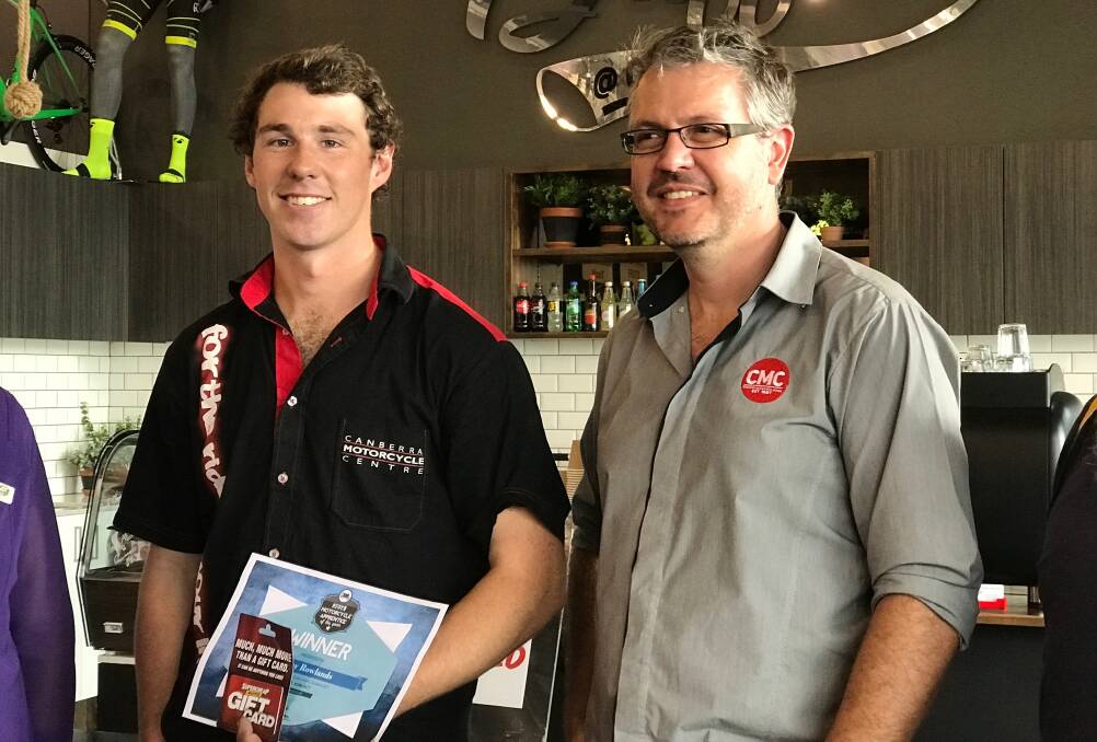 TOP MECHANIC: Goulburn man Sid Rowlands receiving his award with the general manager of Canberra Motorcycle Centre, Darren Jeffrey. Photo: supplied