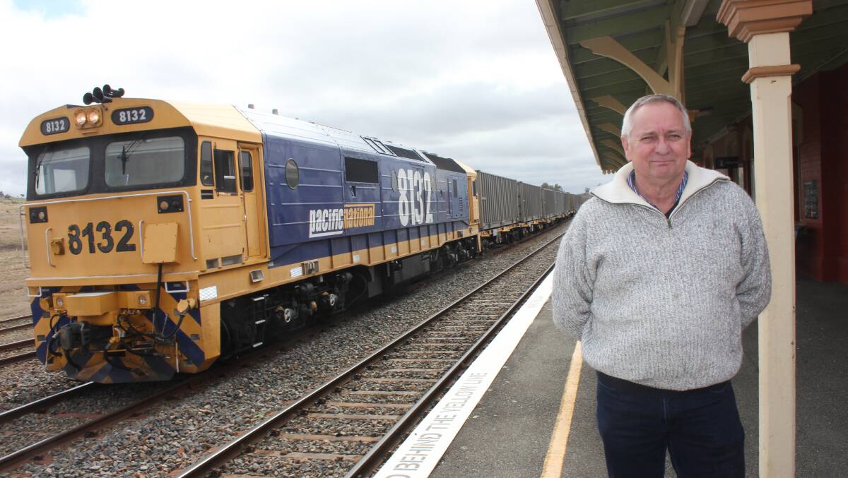 WASTE TRAIN: Tarago resident Adrian Ellson at the station as the waste train comes in and parks on the railway siding. Photo: David Cole