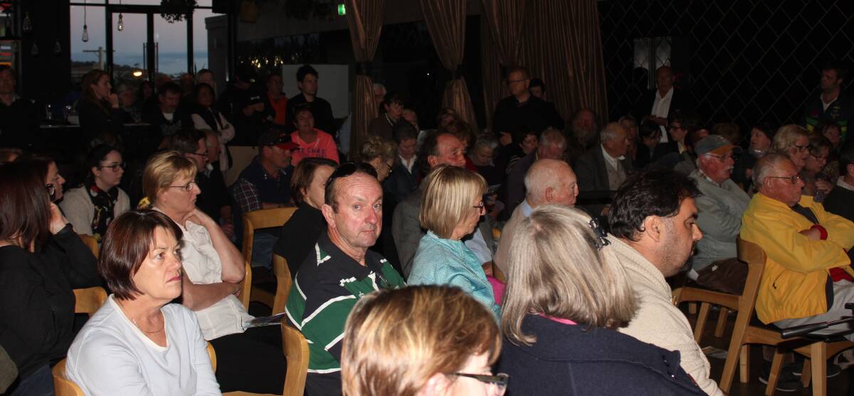 SEEKING ANSWERS: Some of the large crowd at the Politics in the Pub at the Astor Hotel on Monday night.