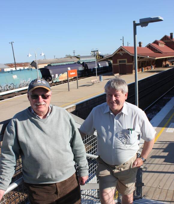 BUILD THEM HERE: STRUG members Greg Price and John Proctor at the Goulburn Railway Station. They have welcomed the announcement that a new XPT fleet will be built, but hope they can be built in Goulburn. 