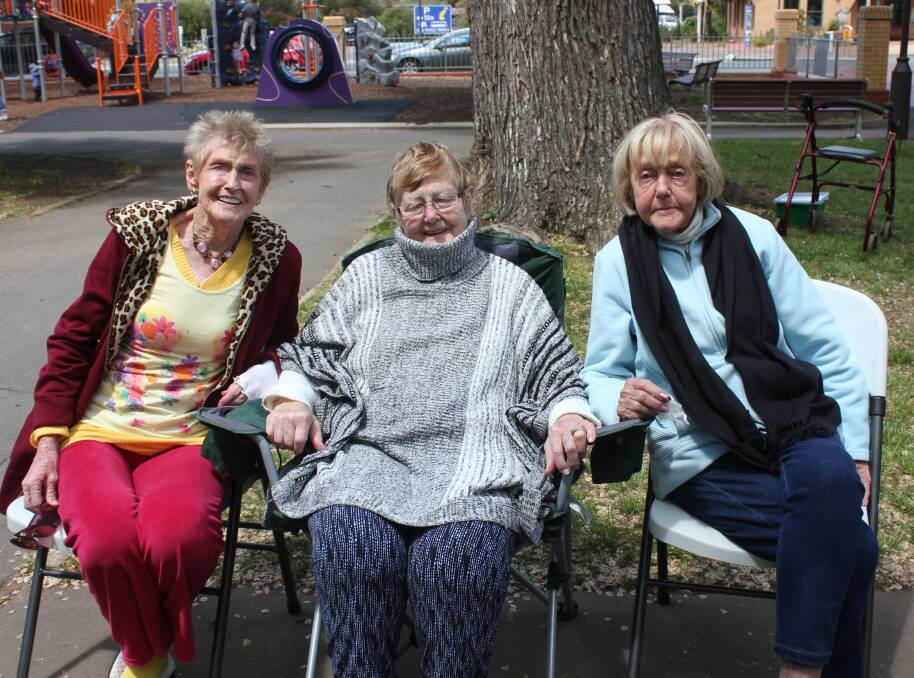SISTERS: Sisters Betty Hepburn, Gwen Donahue and Kate Martin were among the three oldest members of the families who met in Belmore Park on Sunday.