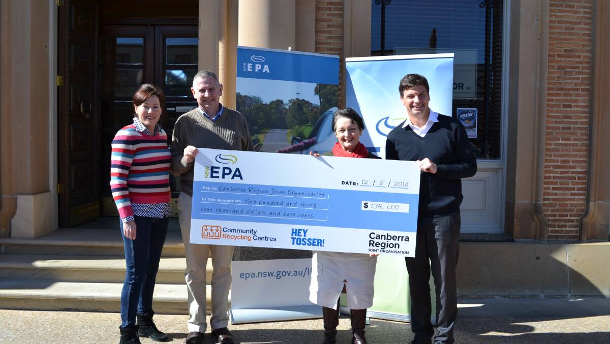 LITTER FUNDING: A representative from the EPA presents the funding to Goulburn Mulwaree Mayor Geoff Kettle, Member for Goulburn Pru Goward and Member for Hume Angus Taylor. 
