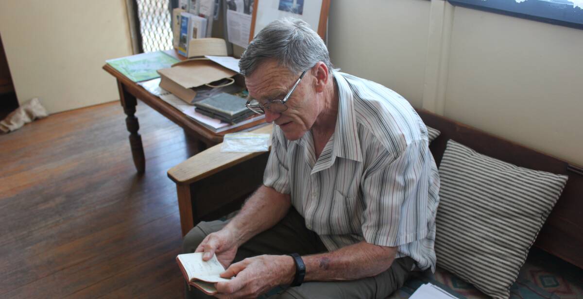 ACCOUNT: Phil reads from his grandfather Arthur Fowler's diary, while up at the Rocky Hill War Memorial Museum. 