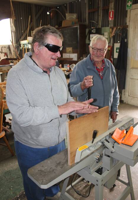 SKILLS: Goulburn Men's Shed president Dusty Field and John Cody in the carpenter's shop at the shed. 