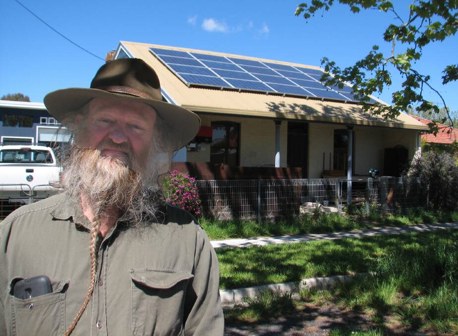 SOLAR FAN: A big fan of solar is former local high school teacher Bill Dorman, who has had a  solar system on his roof for many years. 