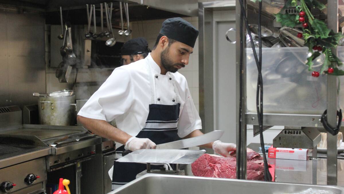 CHEF: Head Chef Bharat Tiwari at work in the kitchen