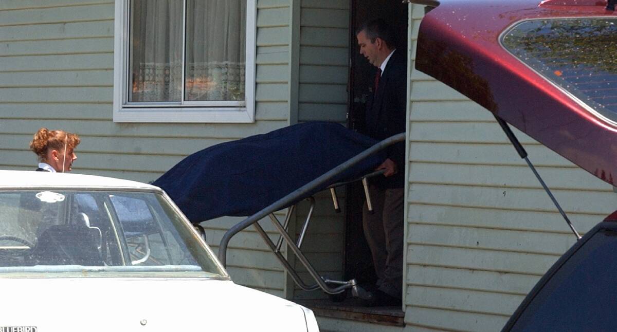 Undertakers remove a body from a Wendouree house in 2002. Picture: Jeremy Bannister