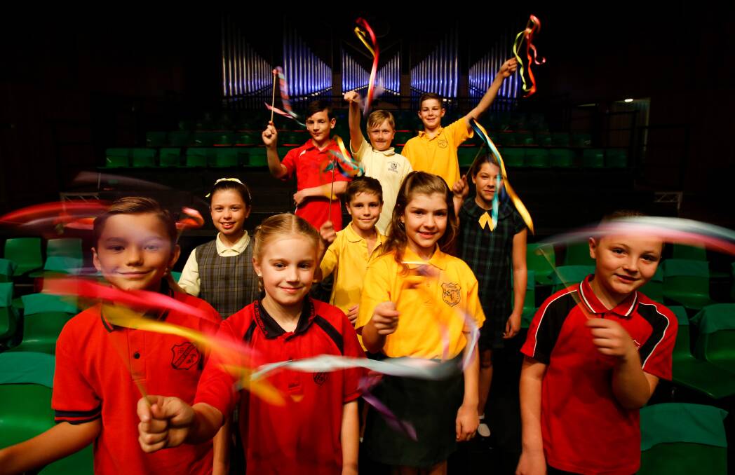 SING STARS: Performers from Kemblawarra, Thirroul, Mt Kembla, Stanwell Park and Coniston public schools who will perform in the mass choir during the Choral Festival at Wollongong's Town Hall. Picture: Adam McLean