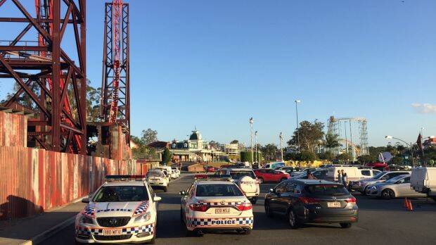 Police and emergency crews remain outside Dreamworld after the horrific accident on the Thunder River Rapids ride. Photo: Tony Moore