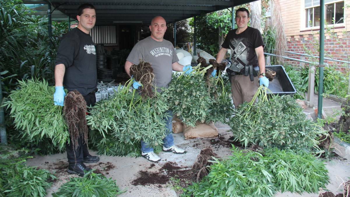 First Constable Luke Mernik, Acting Senior Sergeant Steve Armati and Senior Constable Daniel Wiseman with some of the drugs. Picture: NORTH CENTRAL NEWS