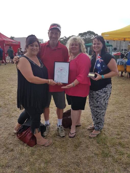SUCCESS: Chrissie Wursten, Jeremy Porter, Kerry Lawrence and Kim Gray proudly display the award recognising Tallong Apple Day at Marulan.