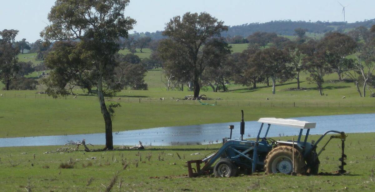 AFTER THE RAIN: Following widespread flooding on the weekend, this piece of machinery was stuck fast in a local paddock and going nowhere soon.
