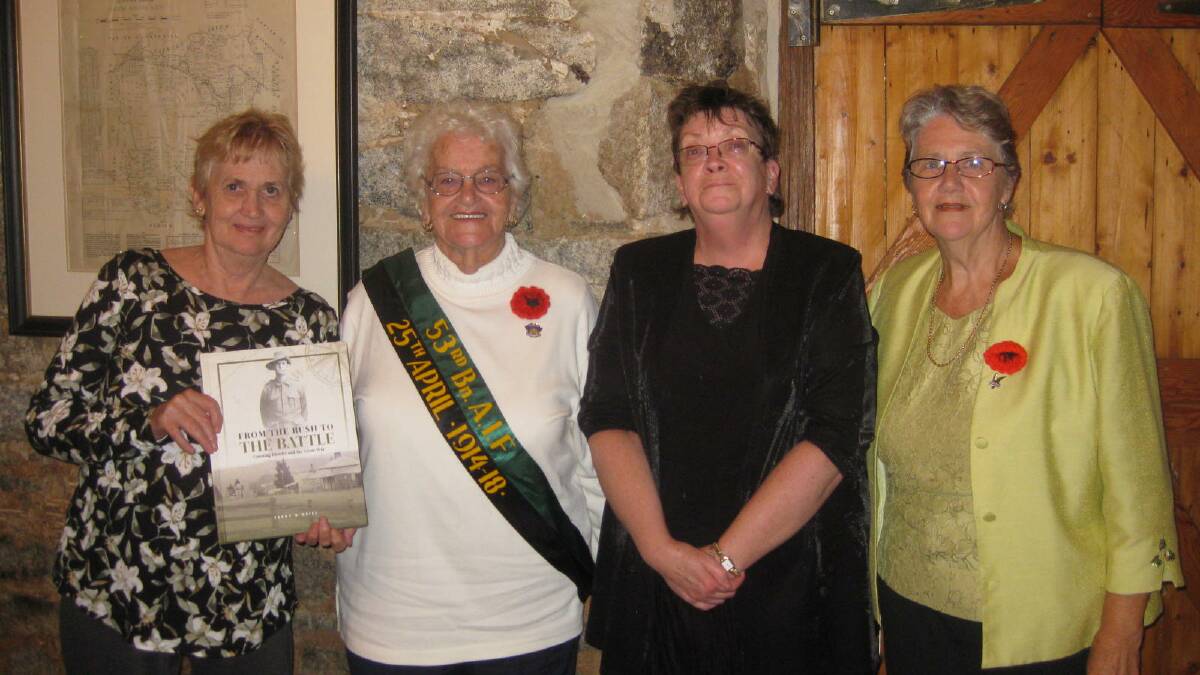 FAMILY PRIDE: Relatives of Private Ravaillion, Kathlean Thomas, Mavis Viner, Terry O'Neill and Marilyn Scott with Terry O'Nell's book "From the Bush to the Battle".