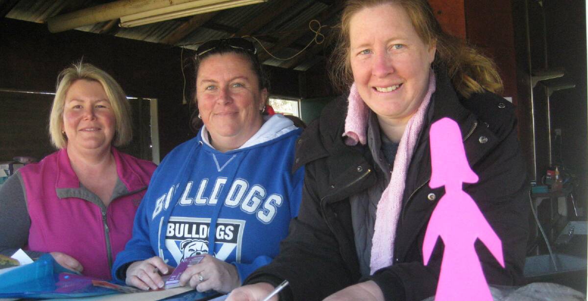 Working hard: behind the scenes selling raffle tickets at the Rooettes vs Boomanulla Raiders match recently were Mel Primmer, Kylie Hazell and Vanessa Mackay.
