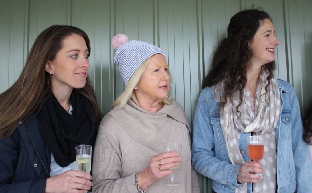 AT THE FOOTY: Emma Bilsborough, Annette Hand (social co-ordinator) and Georgie Henderson were pleased with the success of their fundraising day. 