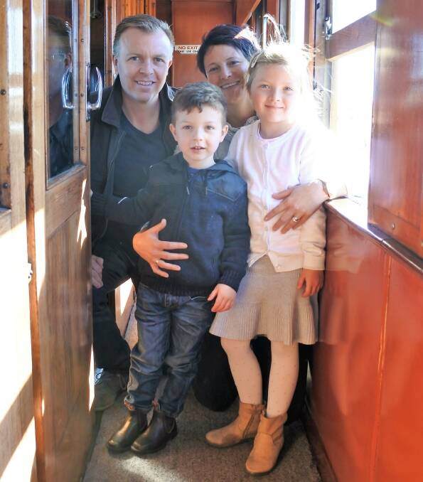 Andrew and Sally Curry of Goulburn took children Jack and Alice on the train, delighting in the rushing air of the open windows in cabins pulled along by the restored Beyer-Garratt 6029 engine.