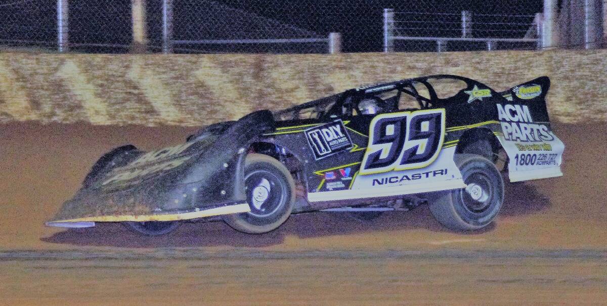 FASTER, FASTER: Ben Nicastri, pictured at the Goulburn Speedway in car 99 last February. Photo: supplied