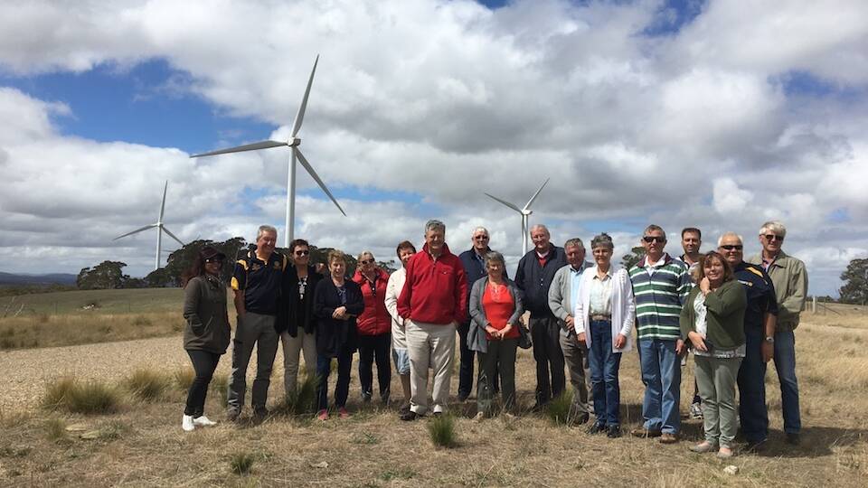 ENERGETIC: Members of Goulburn Argyle Rotary took a tour of the Gullen Range wind and solar farm recently. Photo supplied.