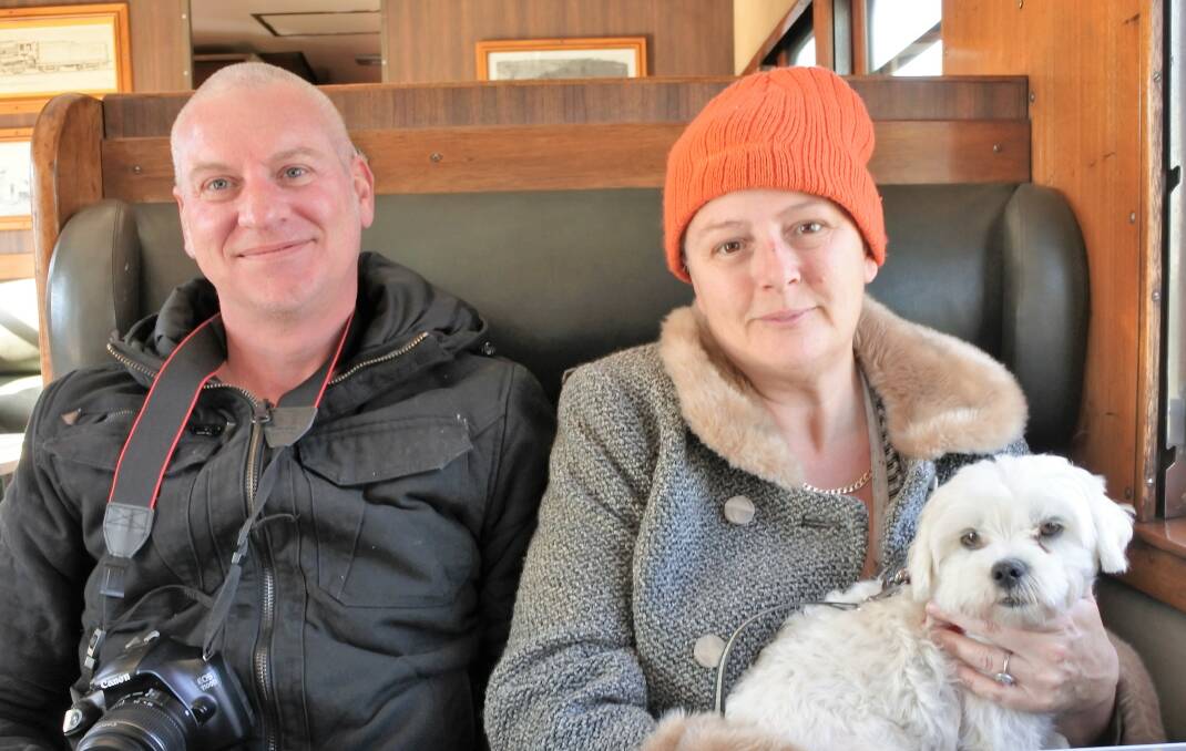 James and Julie Ross brought up their dog Bob from Jervis Bay for a rare treat, a trip on the large and loud locomotive.
