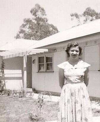 BACK THEN: Noelene Sieler (nee Woodward) in front of the Marulan doctor's surgery, paid for by residents with non-interest bearing debentures, circa 1950s. 