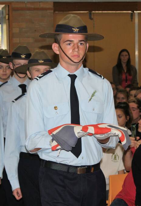 SIGNIFICANT MOMENT: Cadet Under Officer Elijah Fernance during last year's Anzac Day centenary commemoration in Goulburn.