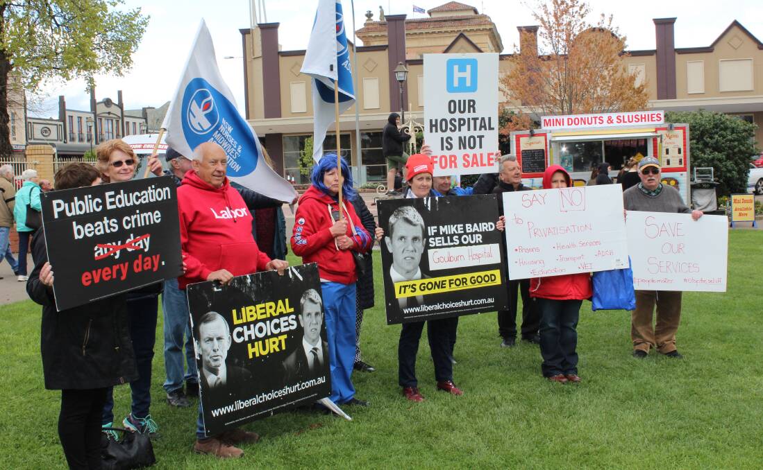 CARERS: The near-silent protest at the Lilac City Festival opening was organised by the NSW Nurses & Midwives Association and Goulburn District Unions. Photo: David Dawson
