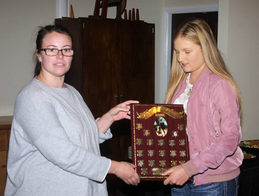 MEMORIAL AWARD: Rodeo Club secretary Sybil Lucas presents the Adele Smith Memorial Award to Shana McLean at the club's thank you afternoon tea on Saturday , May 20. Photo: Darryl Fernance