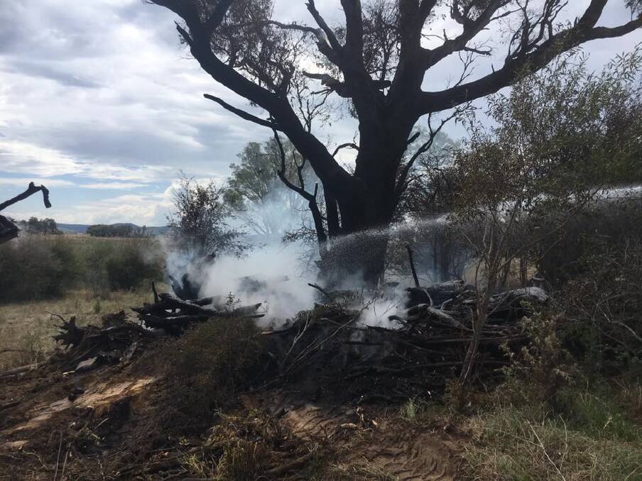 Towrang Brigade was paged to extinguish a fire on Lockersleigh in February, a tree set alight by lightning about 15 minutes earlier. Photo: Towrang Brigade Facebook