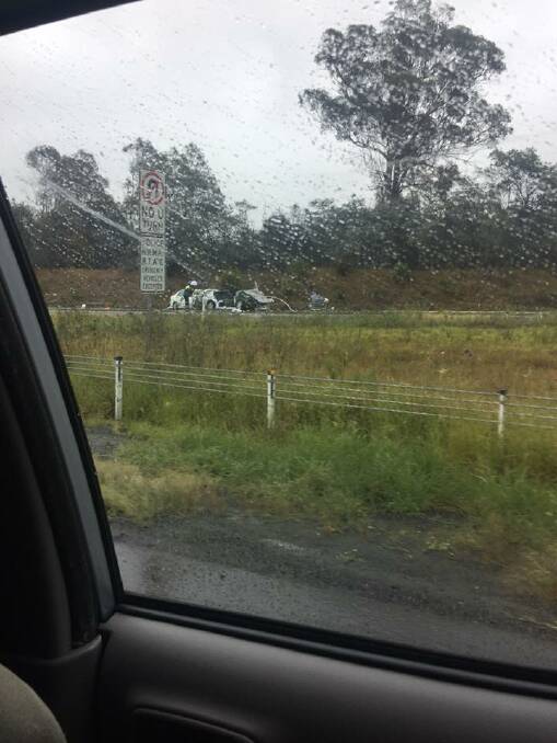 A three-car crash at Alpine on the Hume Highway on Sunday afternoon resulted in hospitalisation of four people with injuries - three drivers and one passenger - and closed northbound lanes with diversions for three hours. Photo: Geoffrey Lee