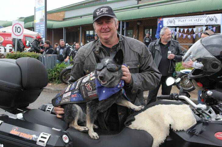 Tex O'Grady and Bundy, who have ridden 1 million kilometres by motorbike for charity. Photo: Helen Nezdropa
