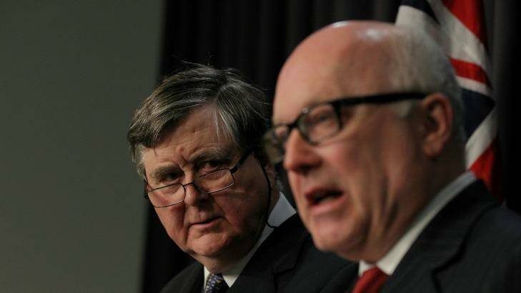 Former ASIO chief David Irvine and Attorney-General George Brandis unveiled the laws in July. Photo: Alex Ellinghausen