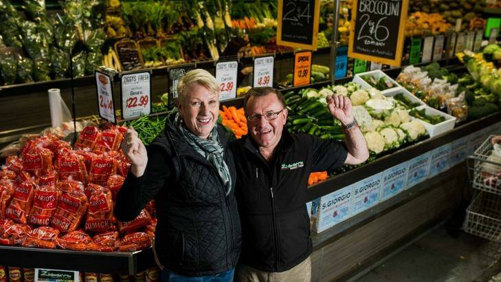 Owners of Ziggy's Fresh at the Fyshwick Fresh Food Markets, Toni and Ken Irvine, celebrate the shop being named Greengrocer of the Year. Photo: Jamila Toderas