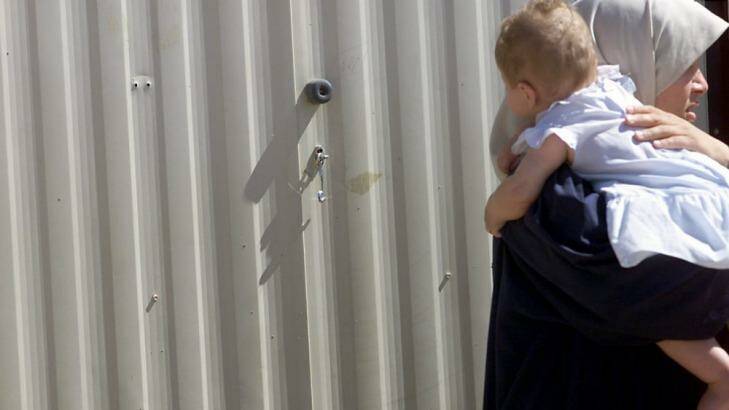 Children are being born and spending extended periods of time in detention, the Ombudsman has warned.  Photo: Paul Harris