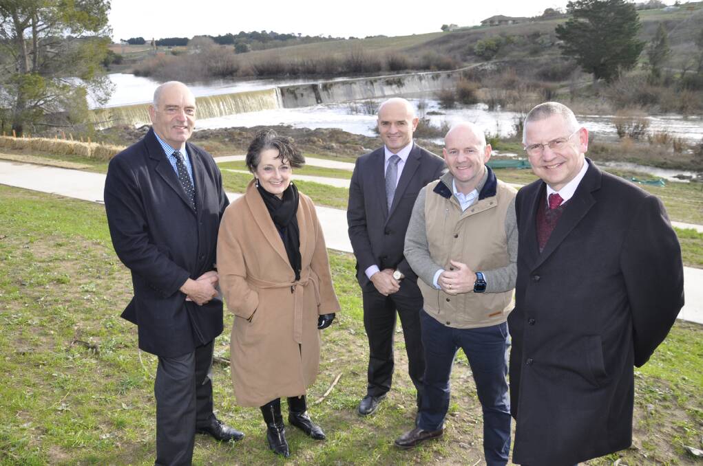 BOOST: Goulburn Mulwaree general manager Warwick Bennett, Goulburn MP Pru Goward, Goulburn Mulwaree operations director Matt O'Rourke, Minister for Lands and Water Niall Blair and Goulburn Mulwaree Mayor Geoff Kettle inspect Marsden Weir near the start of the Wollondilly Walking Track. Photo: Louise Thrower