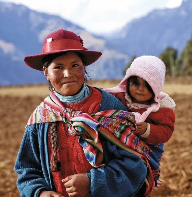 A Peruvian lady with her child.