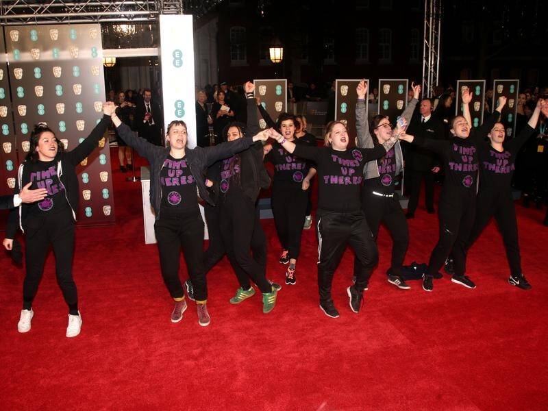 Protesters have stormed the red carpet at the BAFTA awards in London.