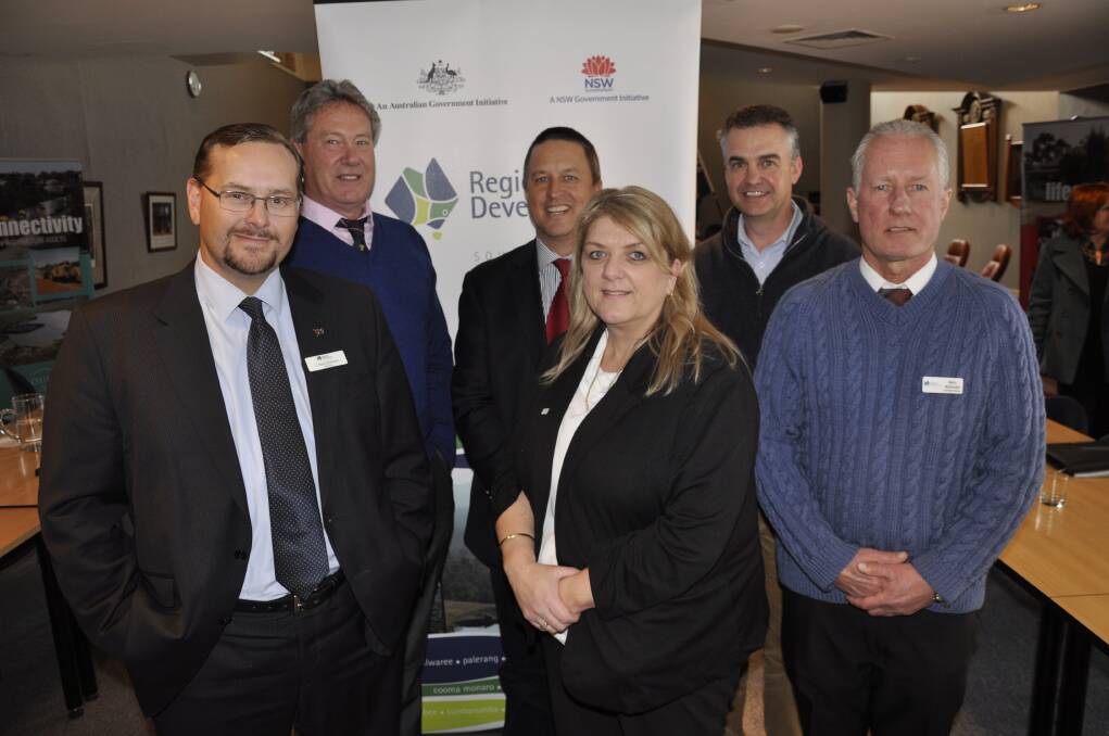 YARNING: Regional Development Australia Southern Inland chairman Mark Schweikert, Inland Wool Brokers Association president Wayne Beecher, RDASI co-deputy chair Ben Maguire, acting executive officer Mareeca Flannery, Australian Wool Network NSW manager Mark Hedley and RDASI committe member and Goulburn man Barry McDonald at Friday's forum. Photo: Louise Thrower