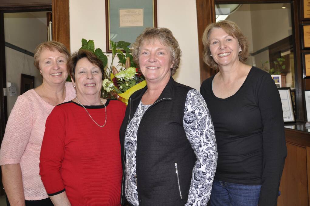 FAREWELL: Karon Jones (second right) signed off on a 42-year career with the Post on Friday, surrounded by Goulburn Group manager Helen Esson (second left) and staffers Jenny Baxter (right) and Susan Clements.