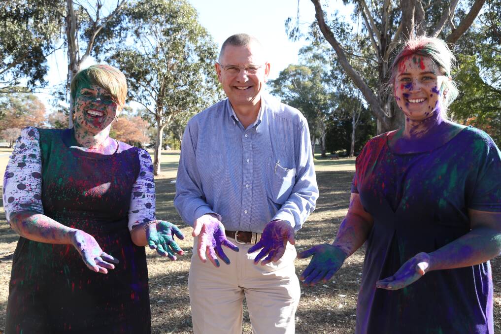 BRIGHT: Goulburn Mulwaree Council's business manager of marketing, events and culture, Sarah Ruberto, mayor Geoff Kettle, and acting team leader of marketing, Paige Penning. Photo: Brittany Murphy