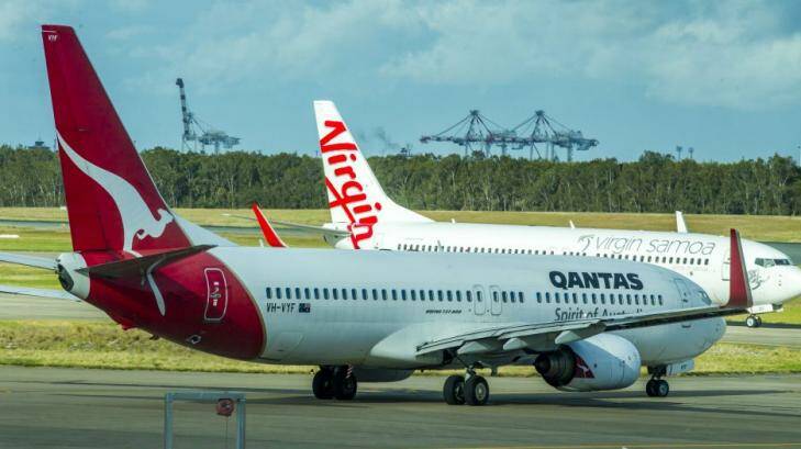 Carbon carry-over baggage: Qantas is in the sights of the ACCC. Photo: Glenn Hunt