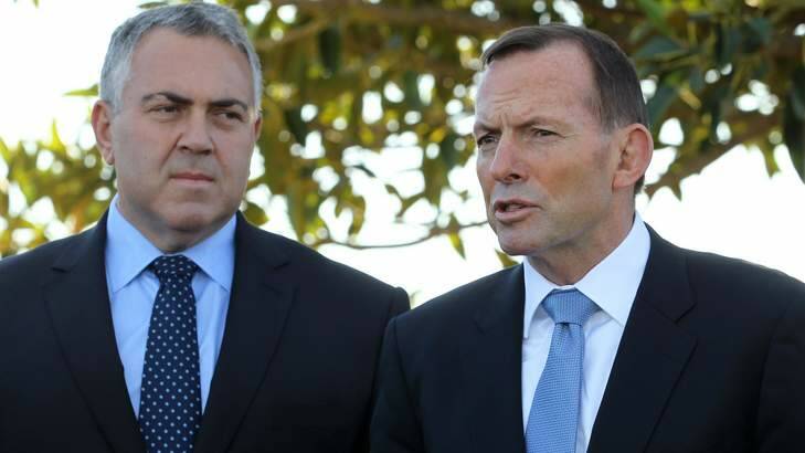 Prime Minister Tony Abbott with Treasurer Joe Hockey. Treasury warned the government its budget measures would hit low-income earners the hardest. Photo: Jonathan Ng
