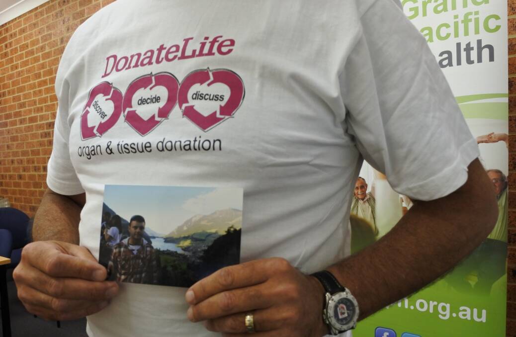 DO A JAMIE: Mr Wilson urges you to talk about organ donation with your friends and family. Continue the conversation on Twitter #doajamie or the Facebook page. Here he holds a photo of Jamie.
