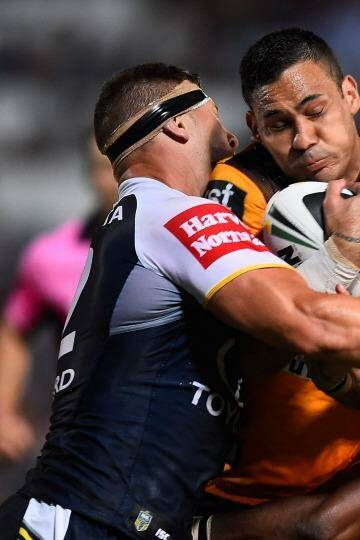 Tariq Sims has copped a five-week suspension for his shoulder charge on Justin Hodges. Photo: Ian Hitchcock