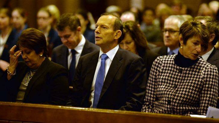 Tony Abbott attend a service for victims of MH17 at St Mary's Catherdral in Sydney in 2014. Photo: Peter Parks