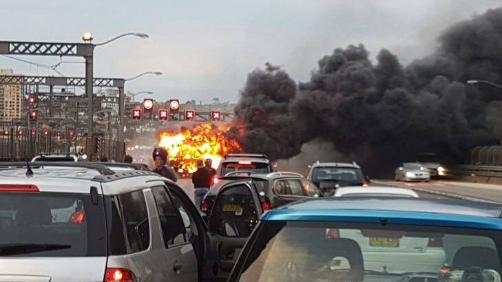 The bus fire brought traffic to a standstill on the bridge. Photo: Paula Tomovic 