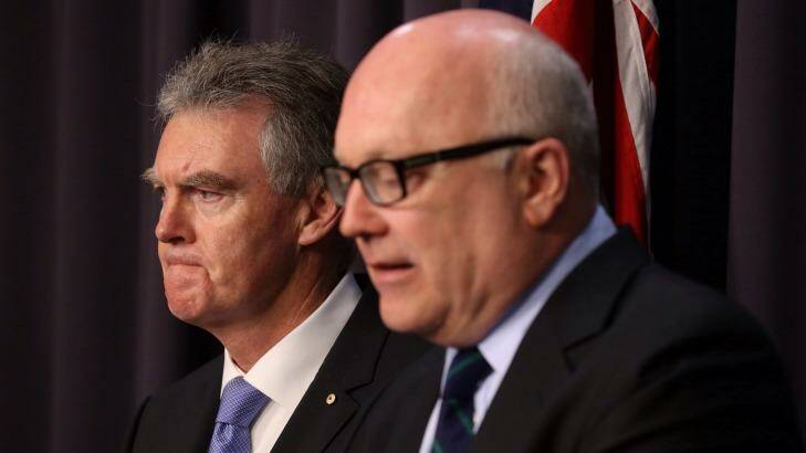 Duncan Lewis, the new ASIO chief, was introduced by Senator Brandis on Monday when the minister announced he would explicitly rule out "torture" under new national security legislation. Photo: Andrew Meares